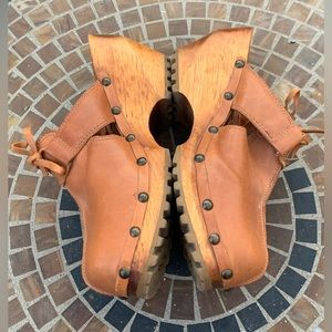 London Underground platform wood clogs, mules